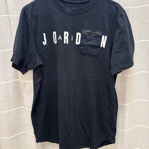 Jordan Black Short-Sleeve Tee with Chest Pocket and White Lettering